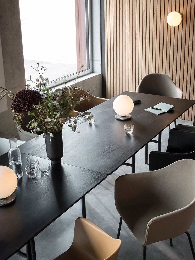 Audo Copenhagen Snaregade Rectangular table in Black Veneer shown in a Scandinavian inspired conference room