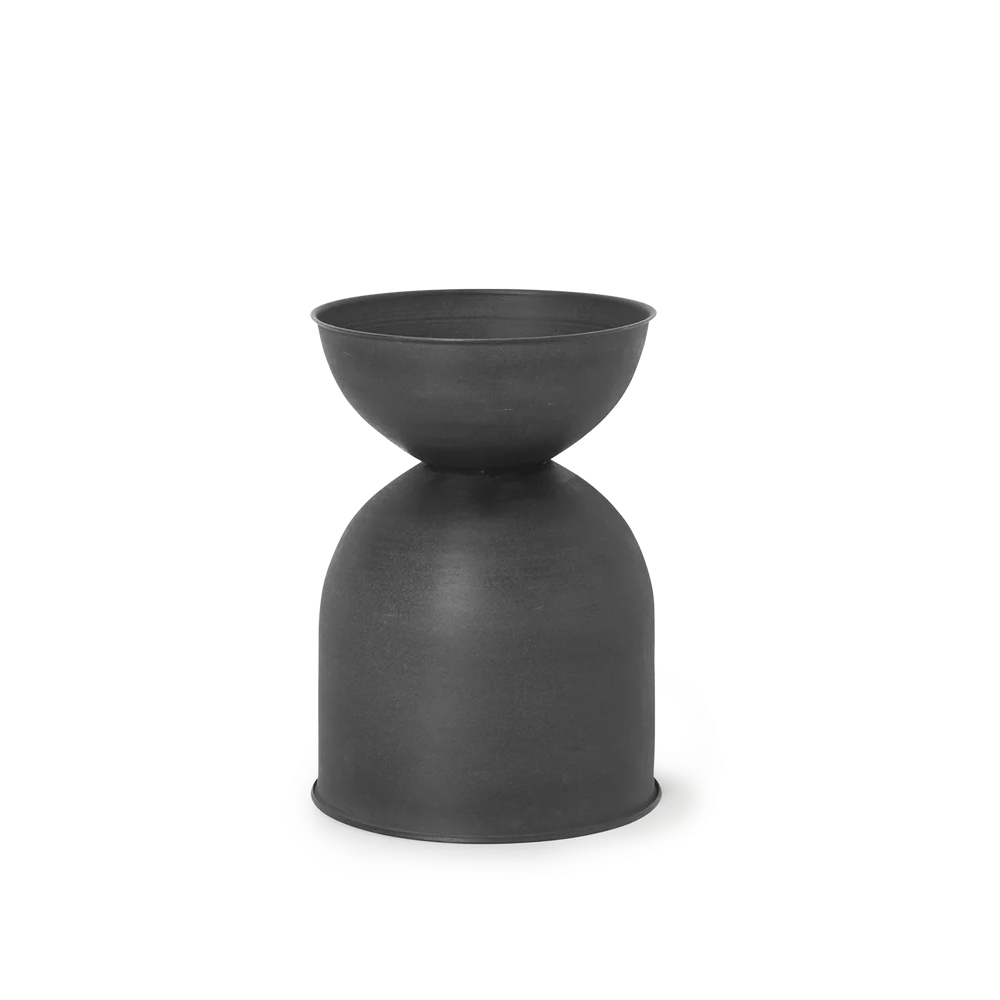 Ferm Living Hourglass Pot in Black, Small — sculptural reversible planter in matte iron.