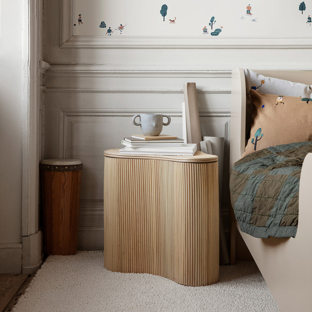 Isola Storage Table used as a bedside table in a calm, Scandinavian bedroom