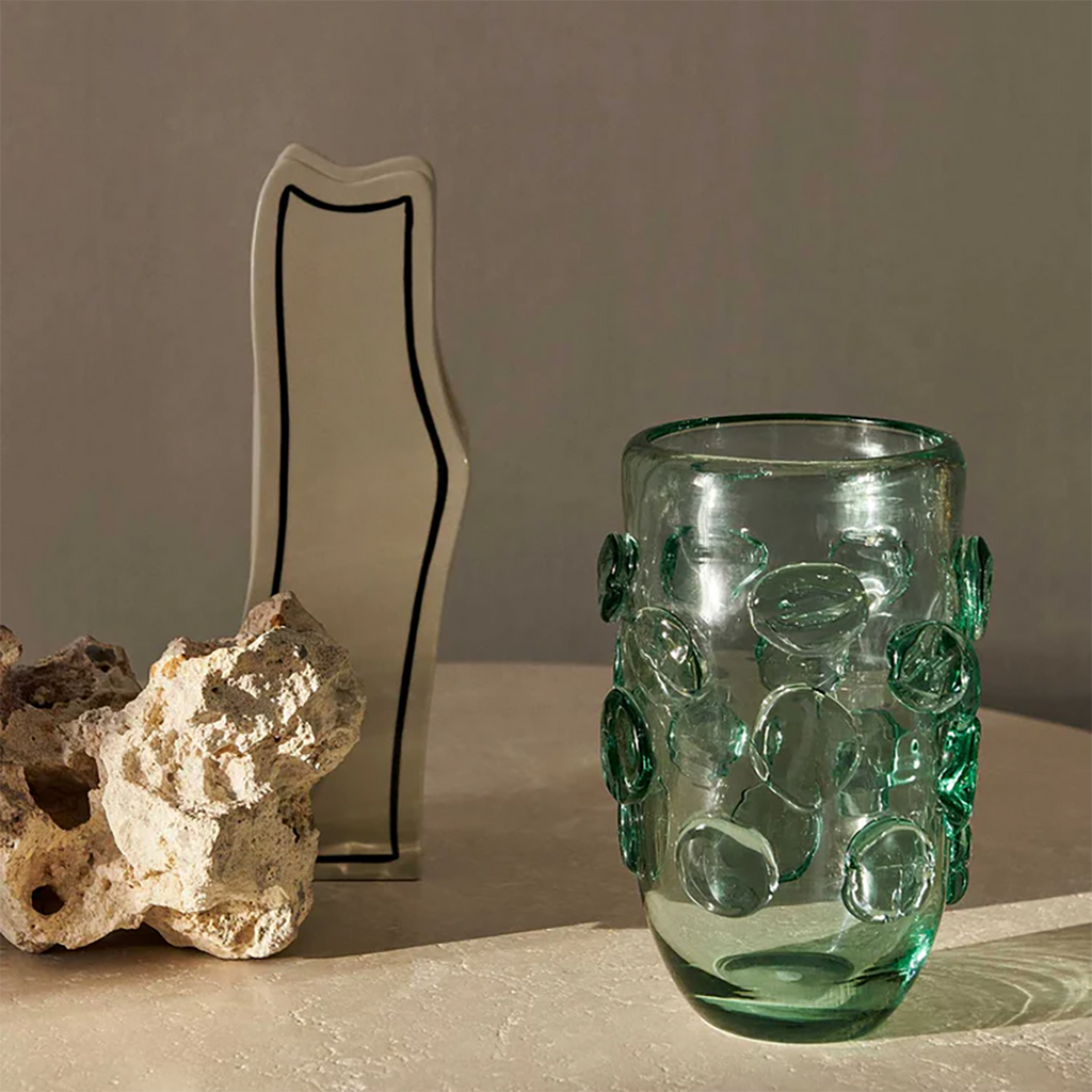 Close-up of the Lump Vase’s uneven, chunky glass dots and green tint