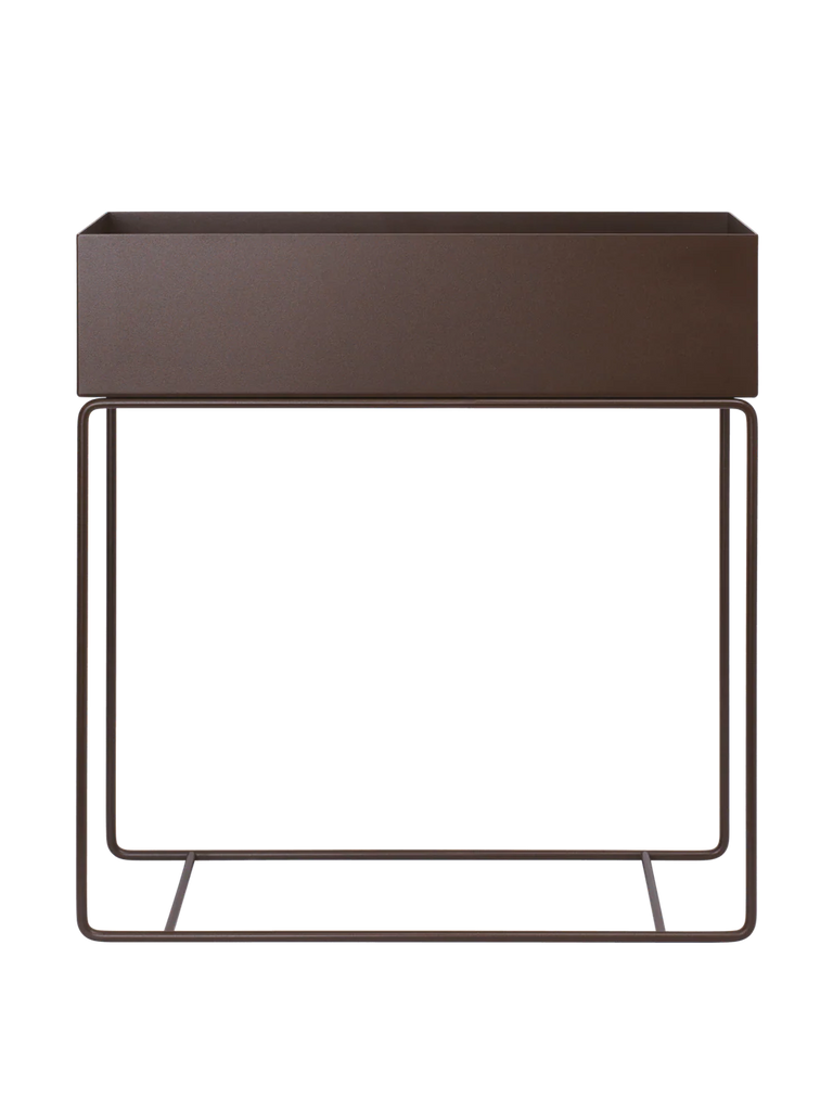 Ferm Living Plant Box in Dark Chocolate — rich brown steel planter with elevated frame and sculptural lines.