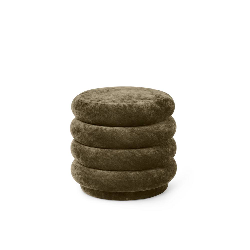 Ferm Living Round Pouf in Forest — circular velvet ottoman in deep green with soft sculptural form.