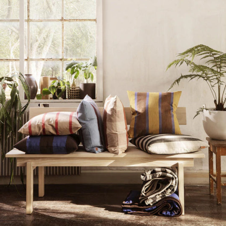 Stack of Grand Cushions in assorted colorways, square 50 x 50 cm pillows