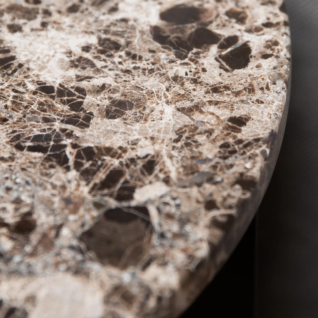 Close up view of Androgyne Side Table in Emperador Dark Marble showing deep chocolate-brown marble with lighter veins