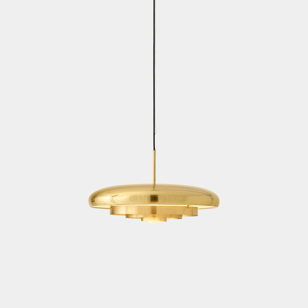 Audo Copenhagen Resonant Pendant in Brushed Brass — sculptural brass pendant lamp with soft, rounded silhouette designed by Norman Foster.