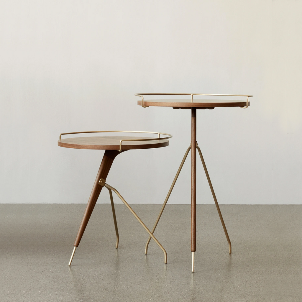 Pair of Umanoff Side Tables in walnut and brass shown side by side on neutral background