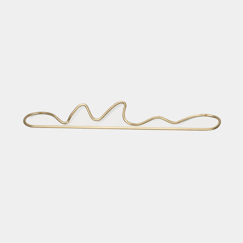 Ferm Living Curvature Hook in Brass — hand-formed solid brass wall hook with organic curved design.