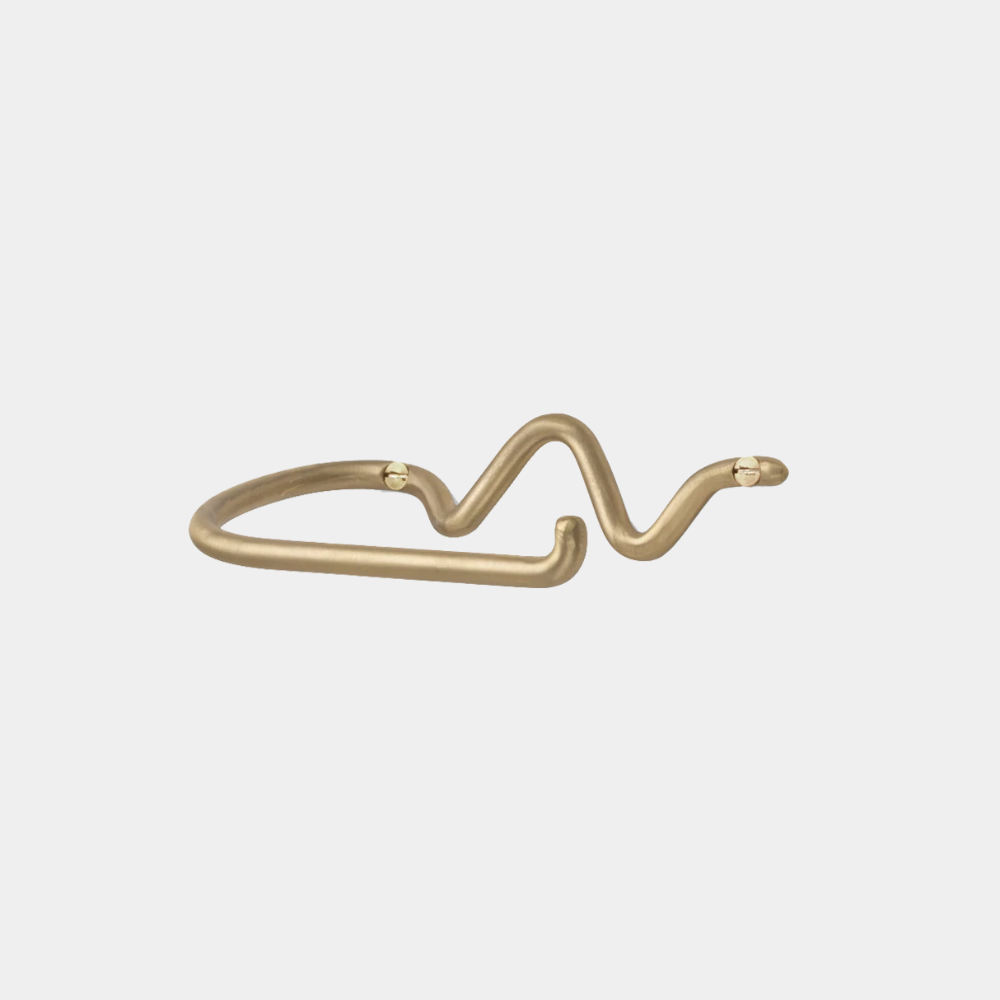 Ferm Living Curvature Toilet Paper Holder in Brass — hand-formed solid brass wall fixture with curved design