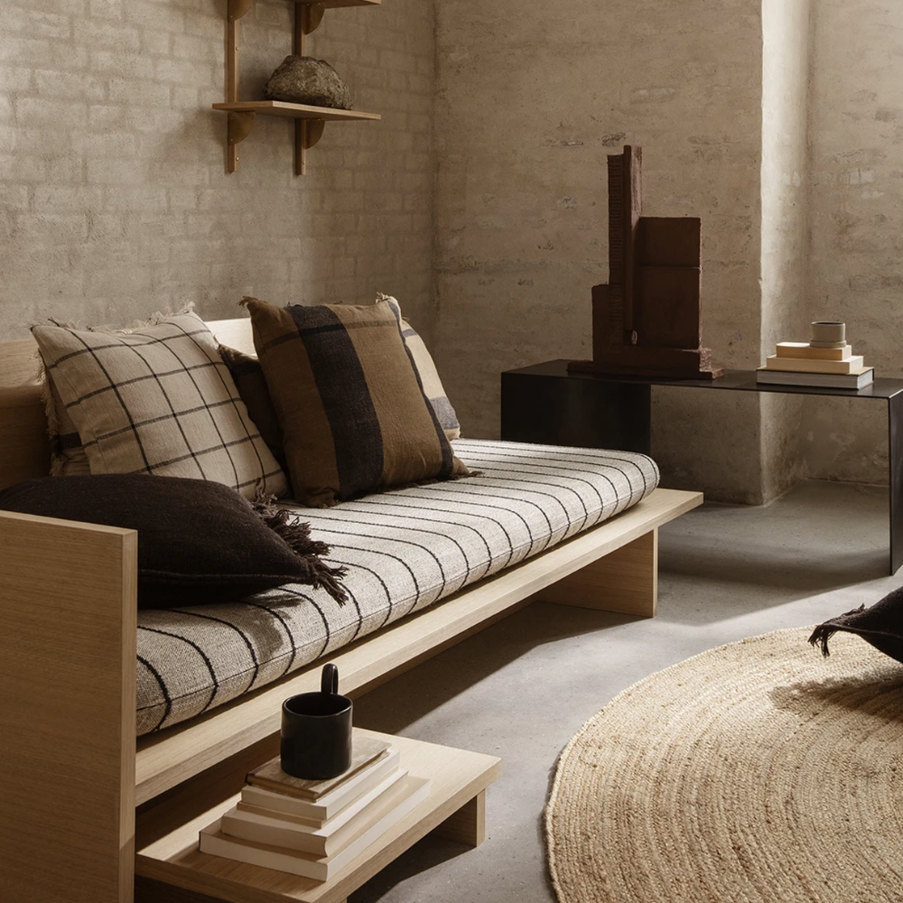 Eternal Round Jute Rug Large by Ferm Living beneath minimalist seating area