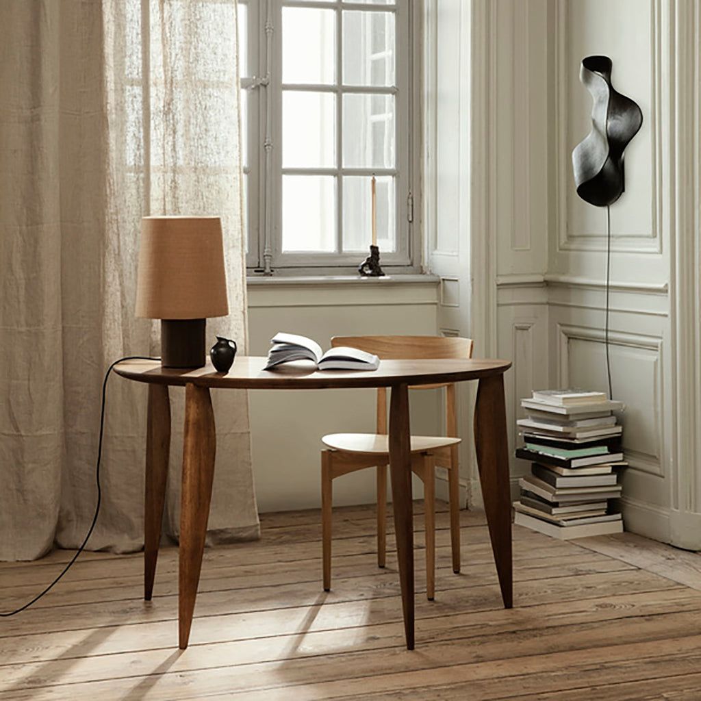 Feve Desk styled as a compact home office—walnut desk with chair, minimal accessories, natural light.