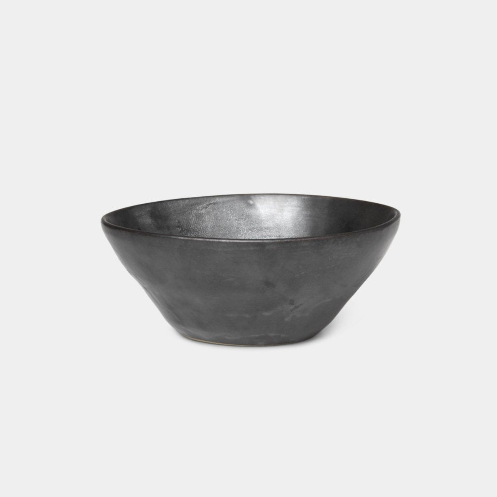 Medium Flow Bowl in Black glazed porcelain with semi-matte finish by Ferm Living, available at Nannie Inez.