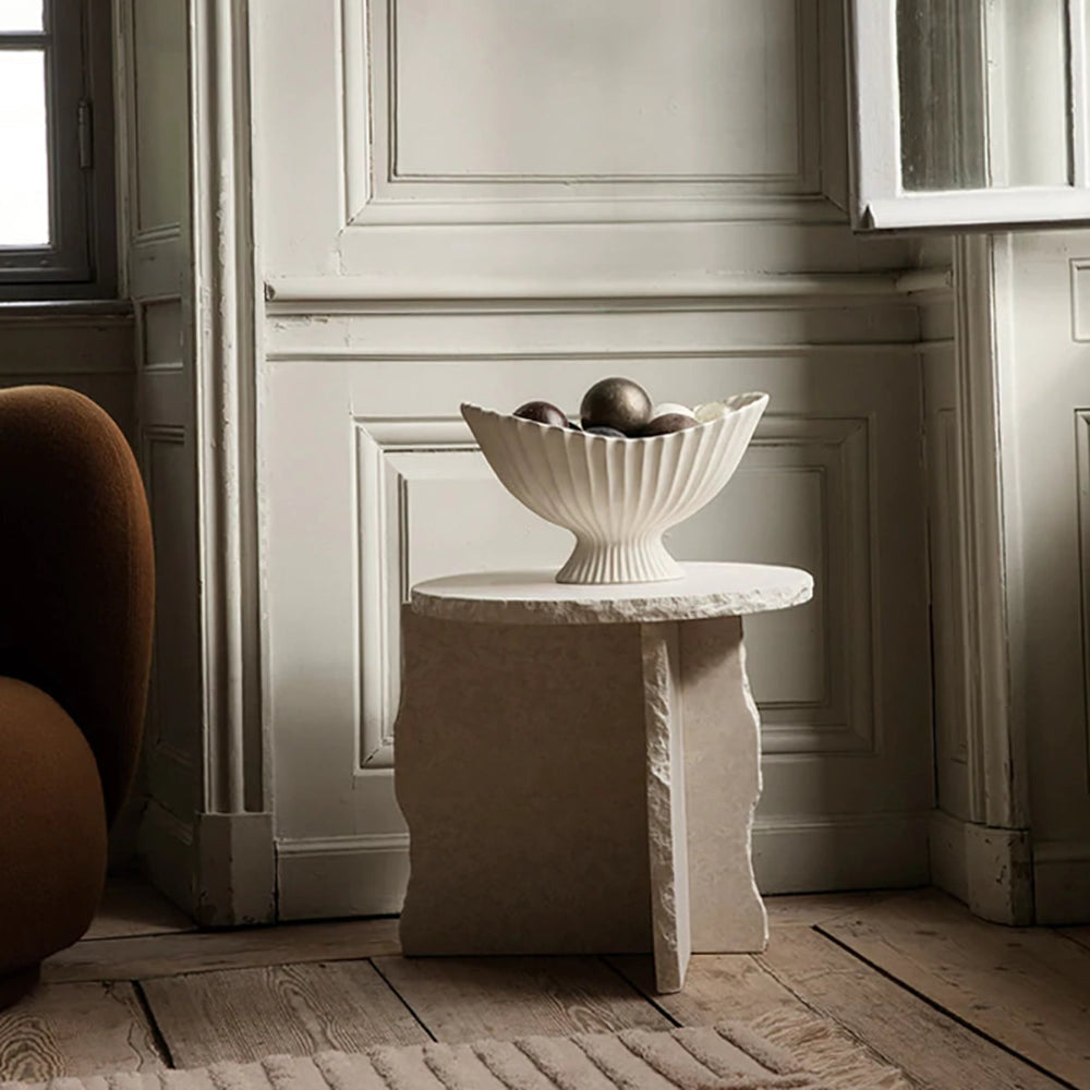 Fountain Centerpiece displayed on a console table holding decorative objects.