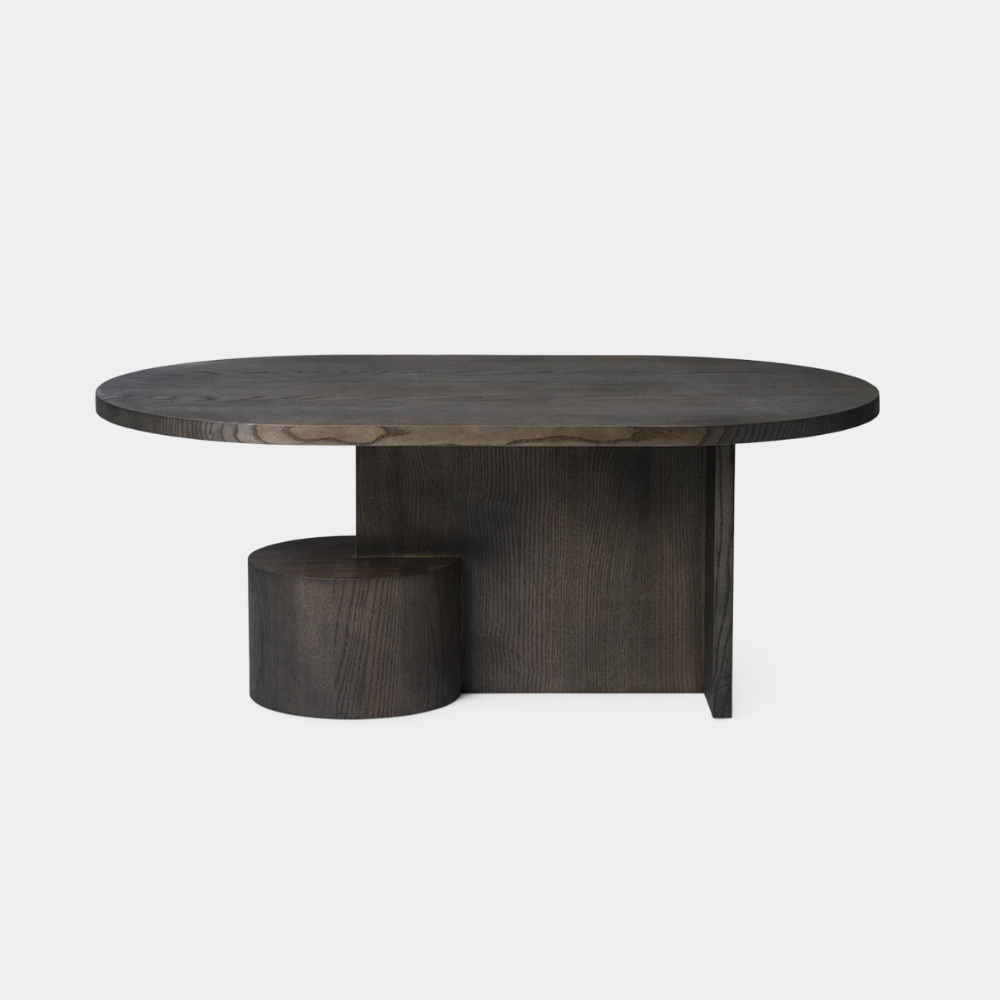 Insert Coffee Table Black Stained Ash in a modern interior — sculptural form with dramatic finish