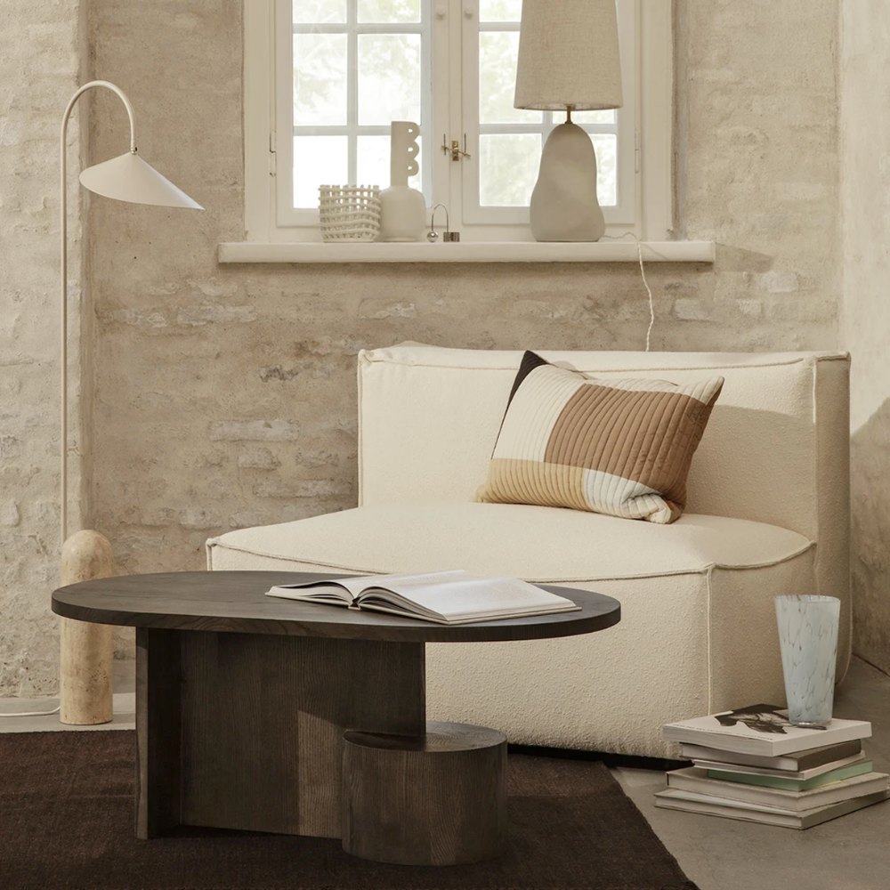 Ferm Living Insert Coffee Table in Black Stained Ash styled in warm minimalist interior.