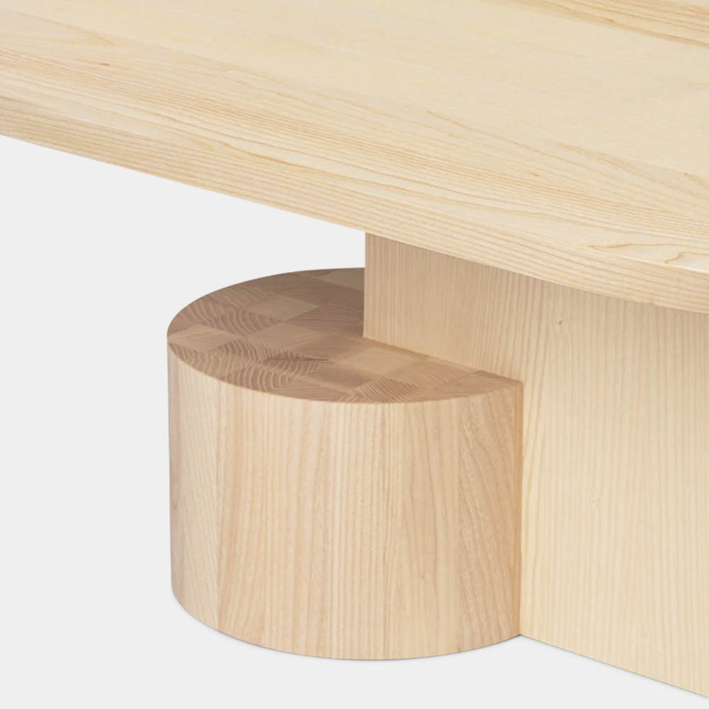 Insert Coffee Table Natural Ash styled in a minimalist living room — showing wood grain and sculptural profile