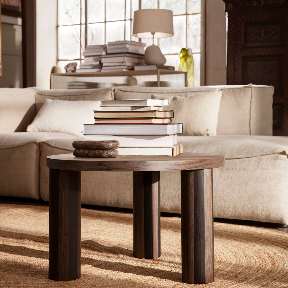 Small Post Coffee Table in smoked oak striped veneer styled in a modern living room.