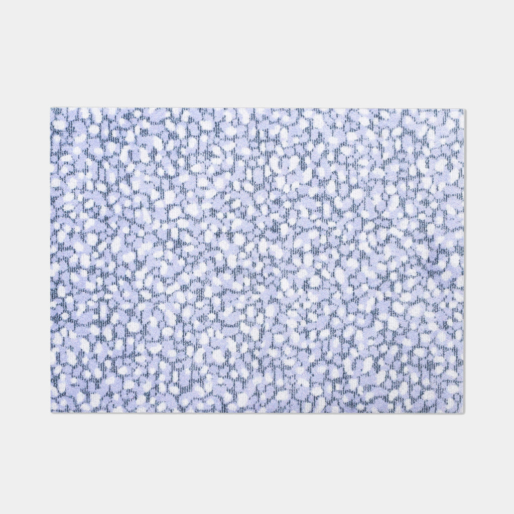 Heymat Grain in color Amethyst, washable slip-resistant doormat.