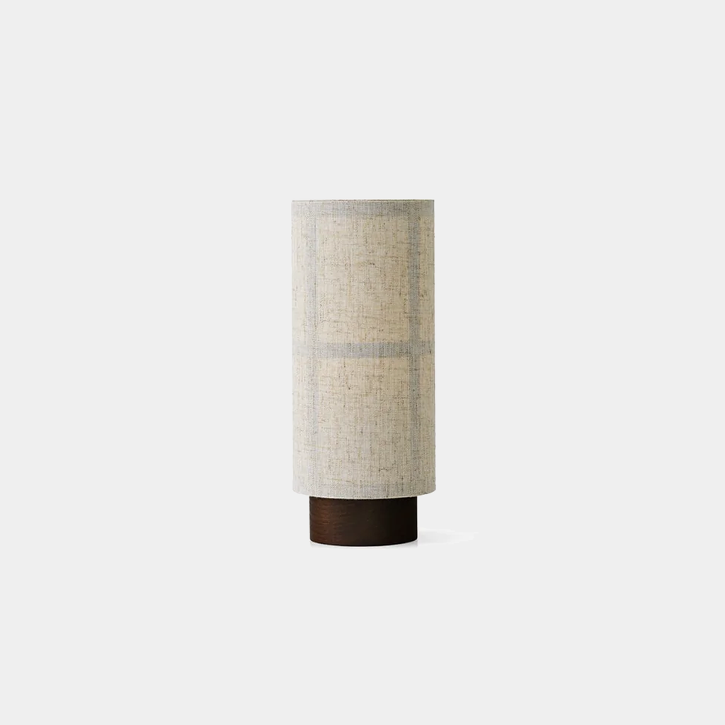 Audo Copenhagen Hashira Portable Lamp with raw linen shade and steel base, shown on a neutral background.