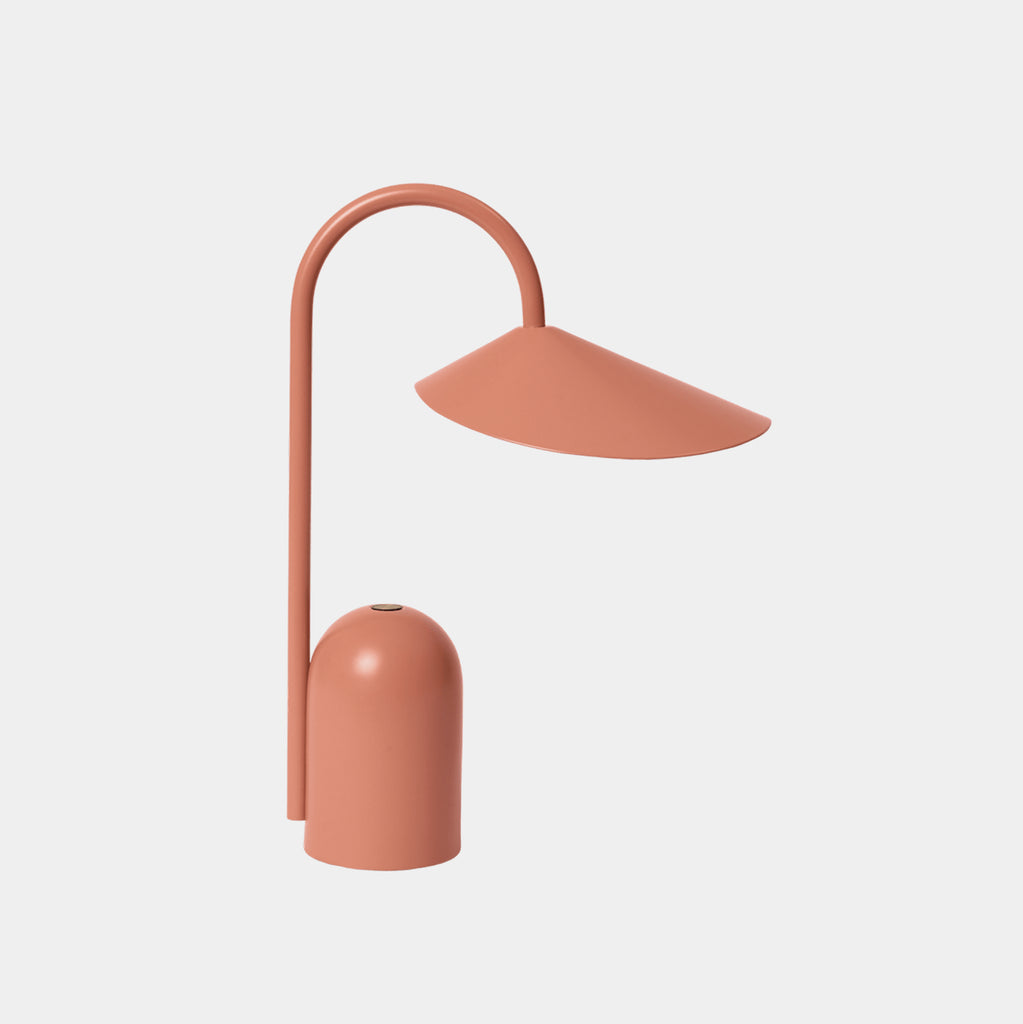 Side view of the Ferm Living Arum Portable Lamp in Sienna, featuring an earthy reddish-brown powder-coated finish.