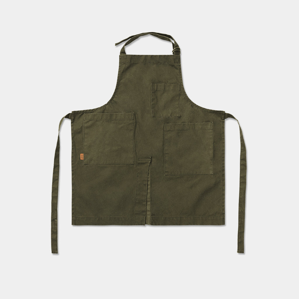 Ferm Living Bark garden apron in olive organic cotton with pockets and adjustable neck strap