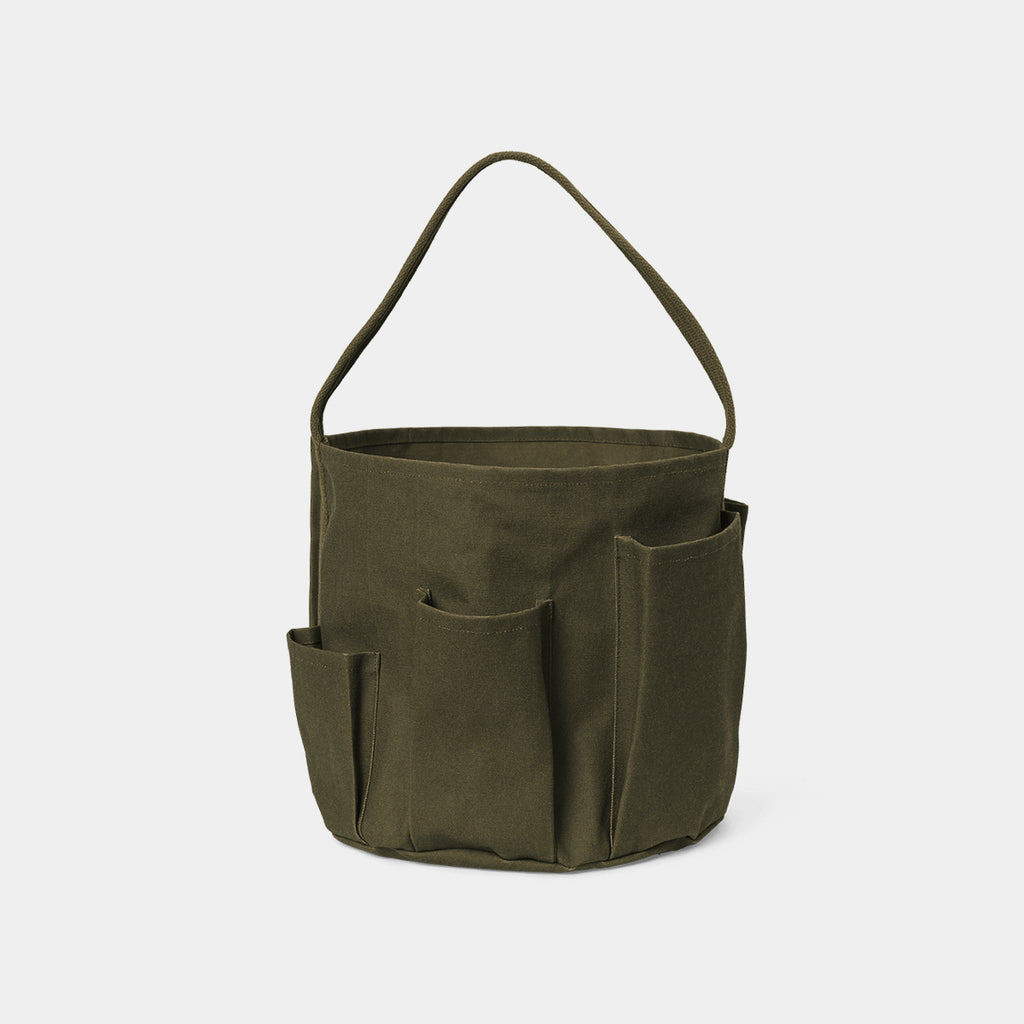 Ferm Living Bark garden bucket bag in olive waxed organic cotton with exterior pockets