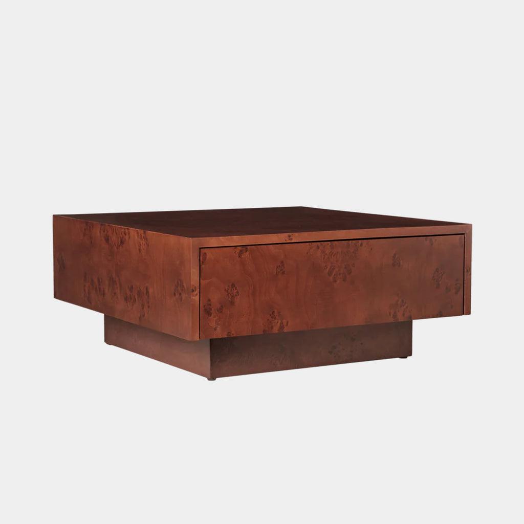 Ferm Living Burl Storage Coffee Table in dark stained burl veneer showing square profile and rich wood grain.