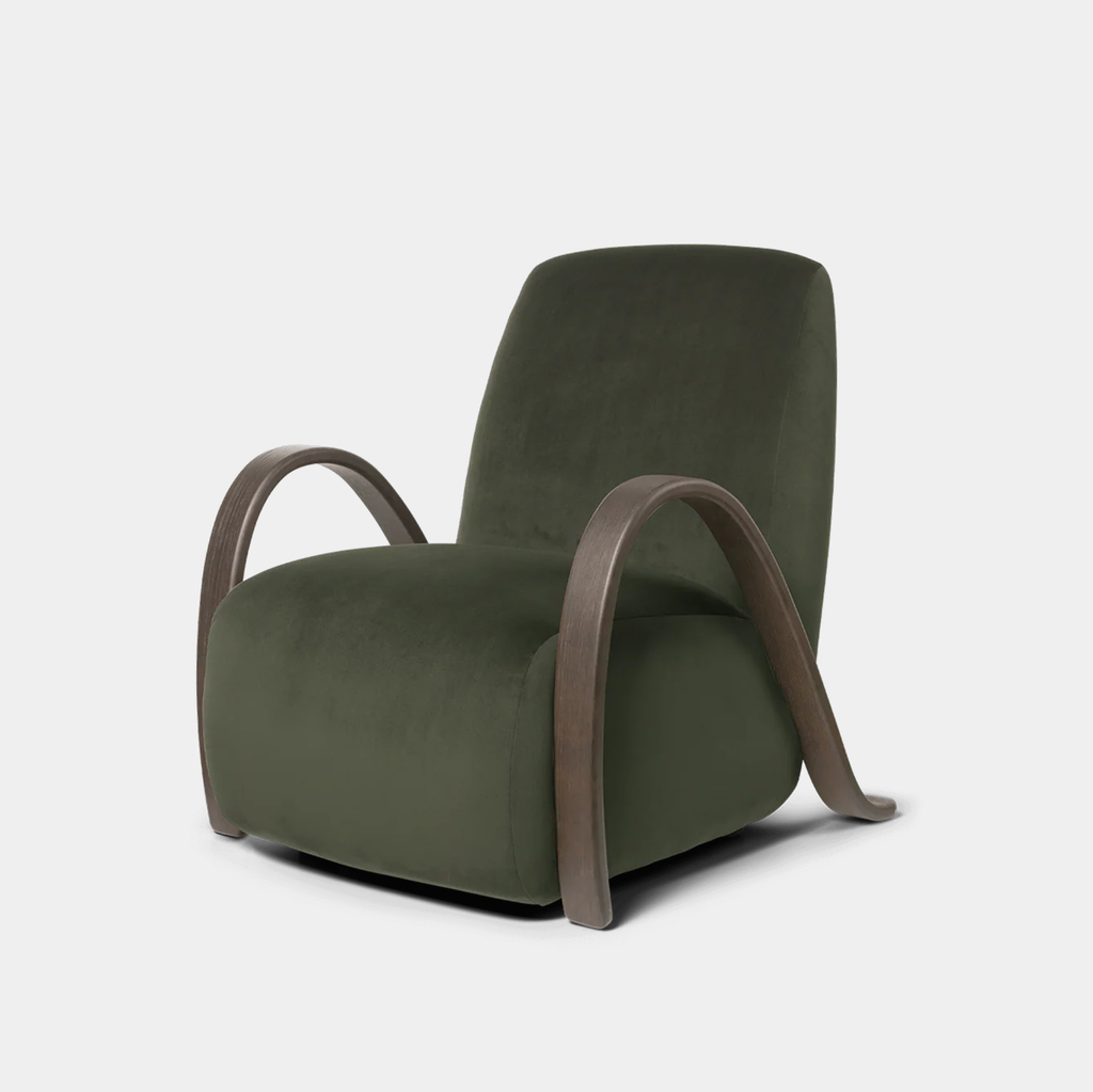 Ferm Living Buur Lounge Chair in rich velvet Pine on neutral background