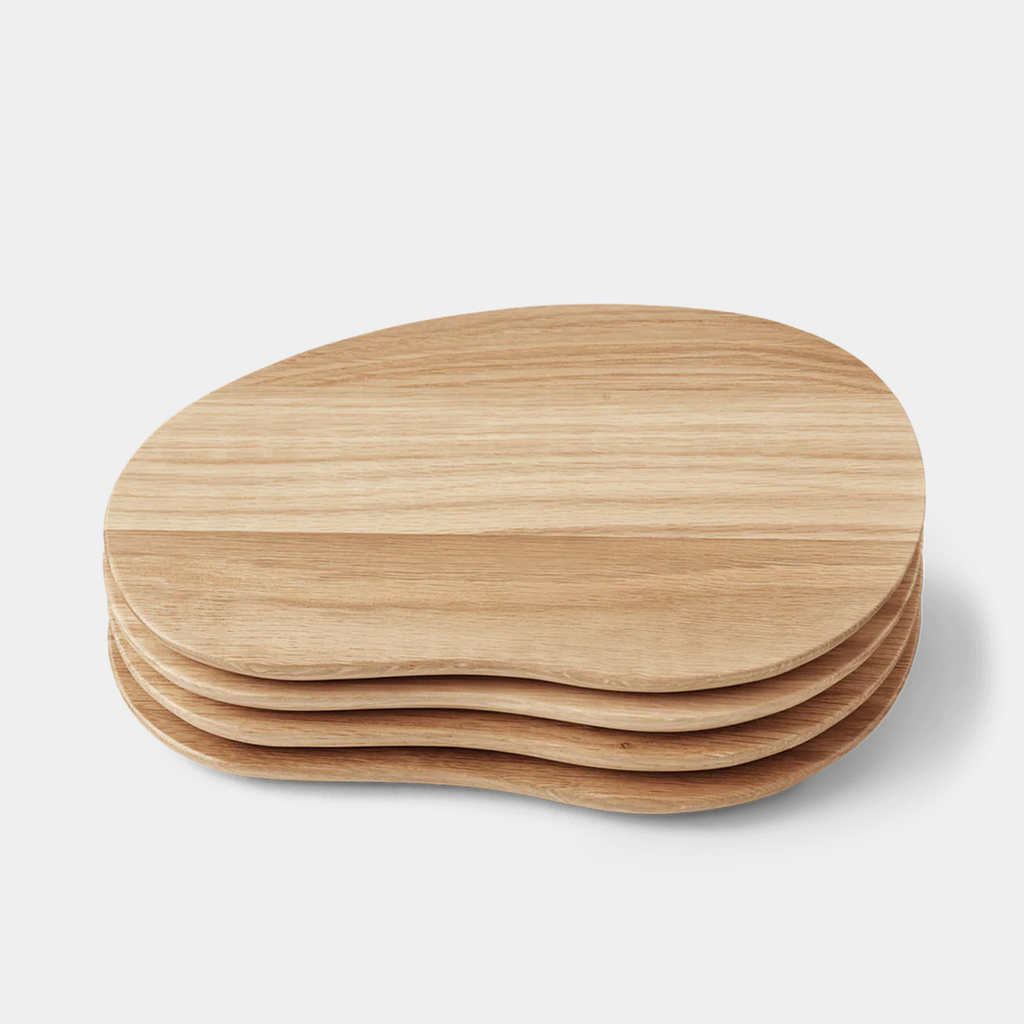 Ferm Living Cairn butter boards set of 4 in sculpted wood with soft rounded forms styled for serving