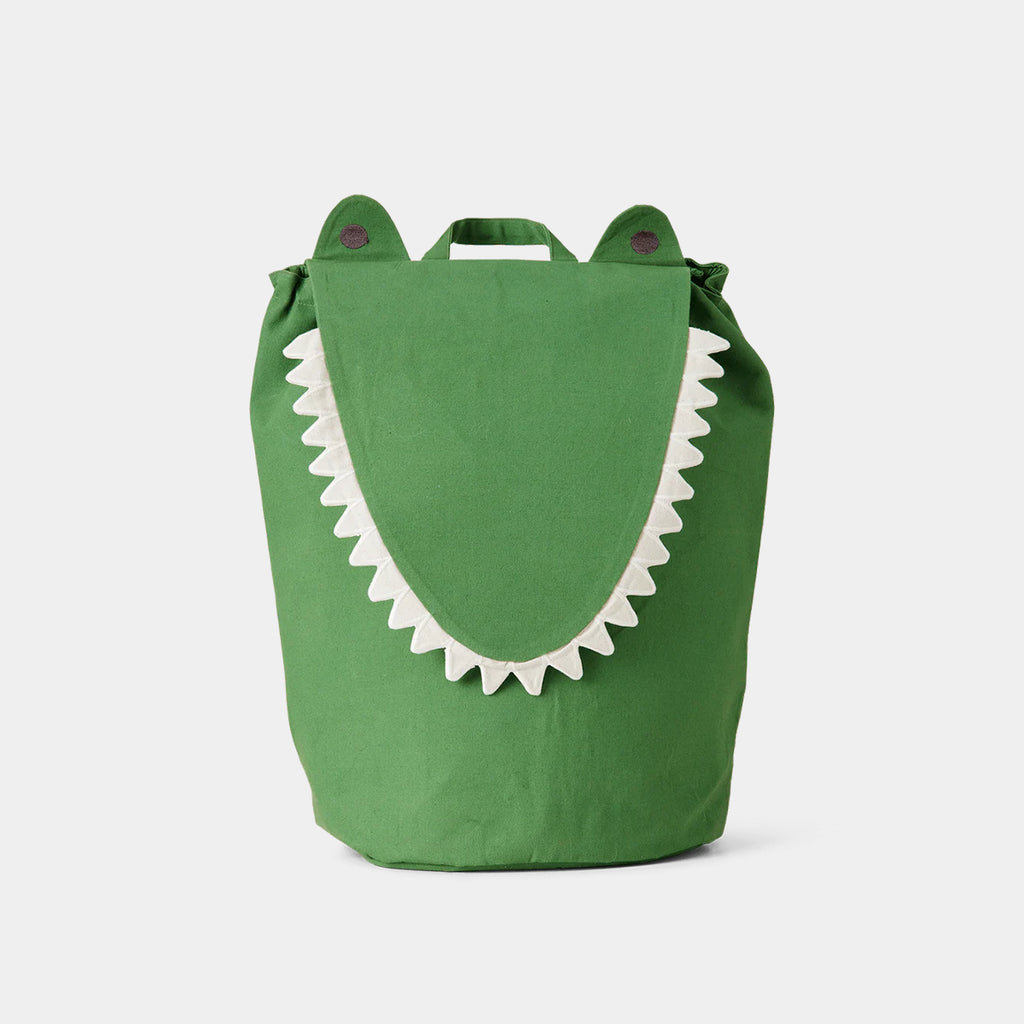 Crocodile Storage basket in Artichoke Green made of organic cotton canvas with embroidered details on a neutral background