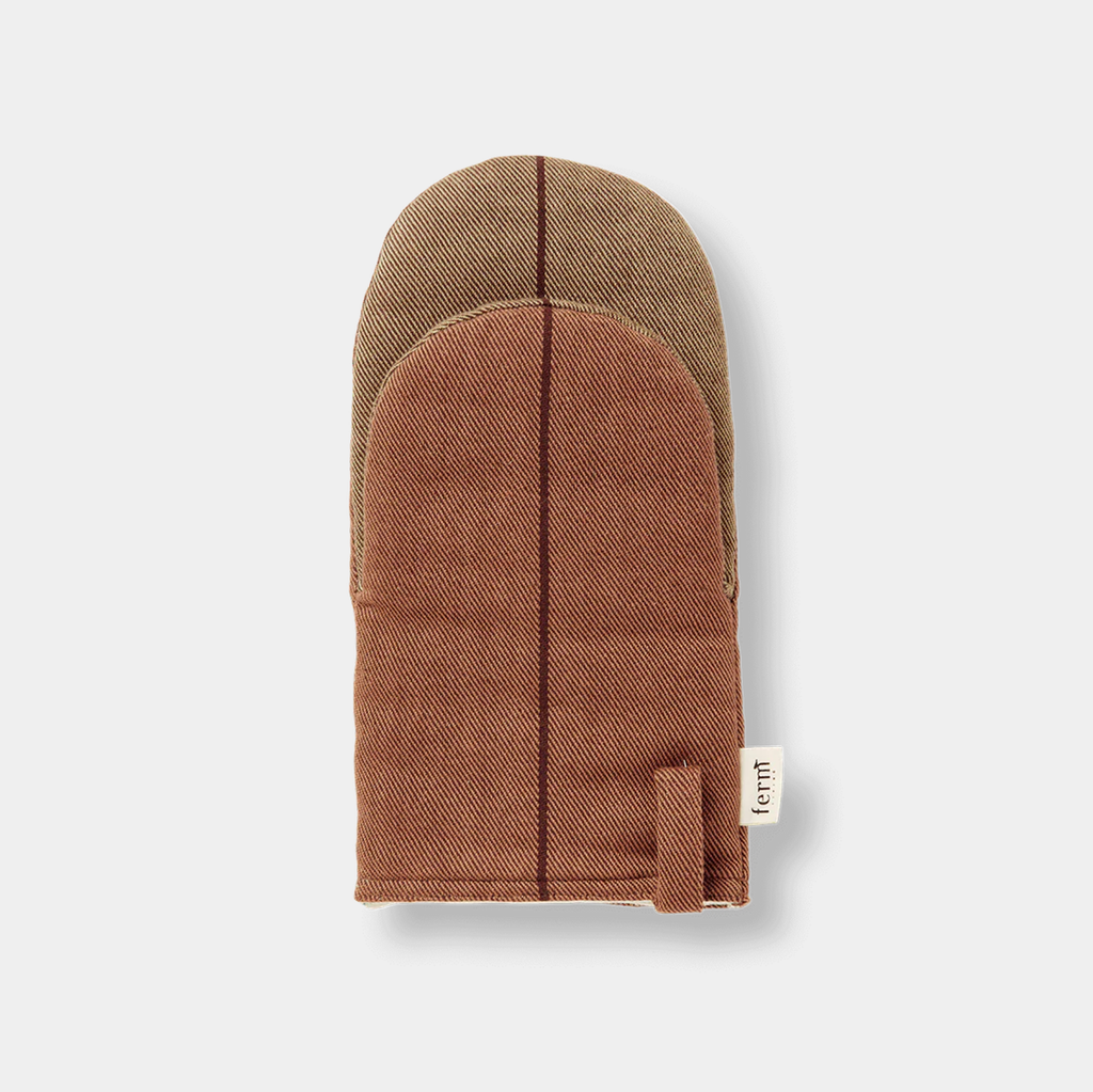 Ferm Living Ito oven mitt in hazel with subtle striped twill design on neutral background