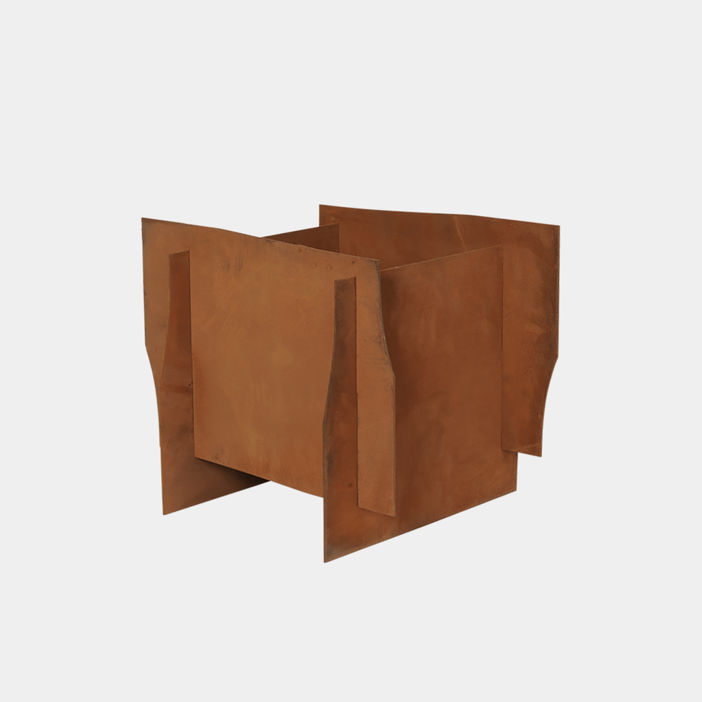 Angled view of Ferm Living Lapel Square planter in corten steel with angular folded form and rust patina finish