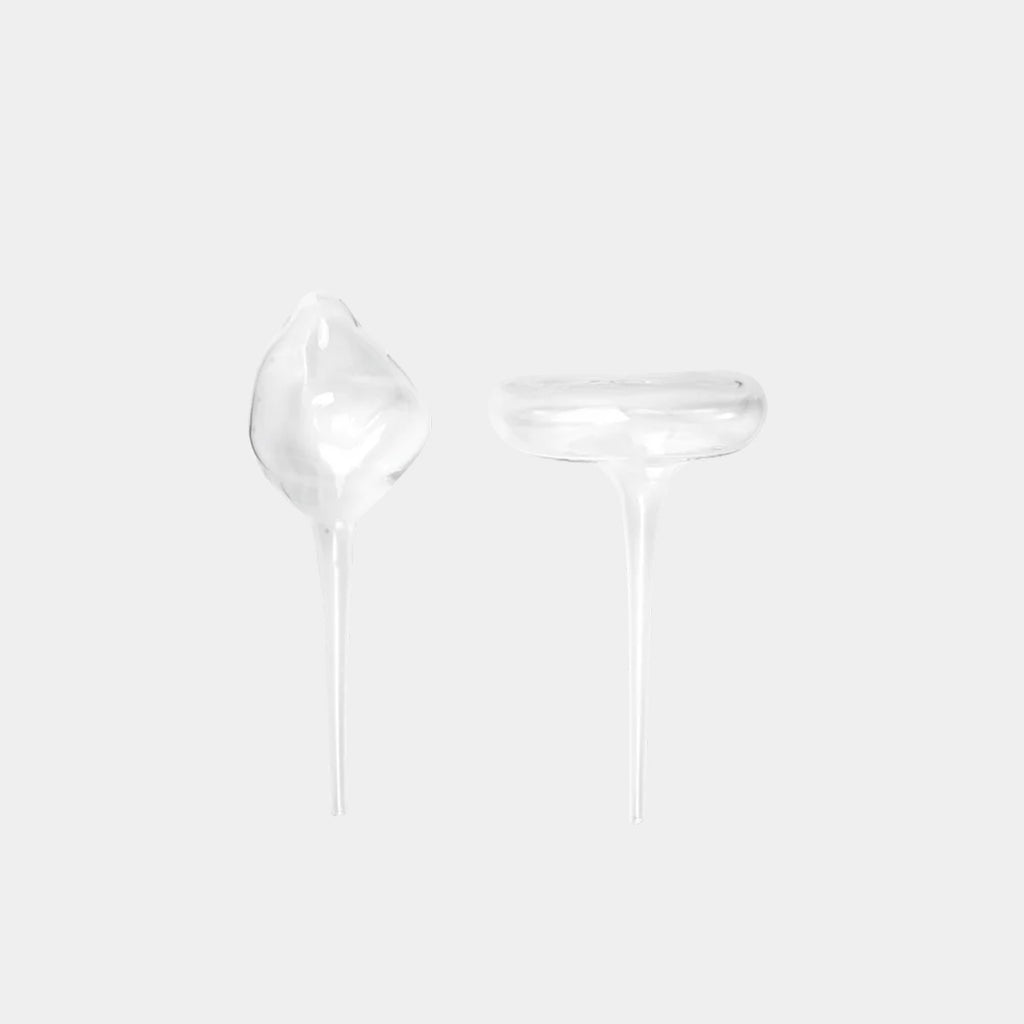 Ferm Living Mercury watering globe set of two in clear mouth-blown glass on neutral background