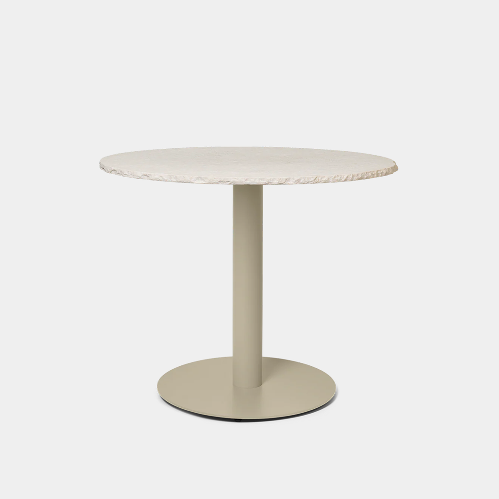 Ferm Living Mineral Dining Table in Bianco Curia marble featuring hand-chiseled edge detail and round stone tabletop with cashmere base