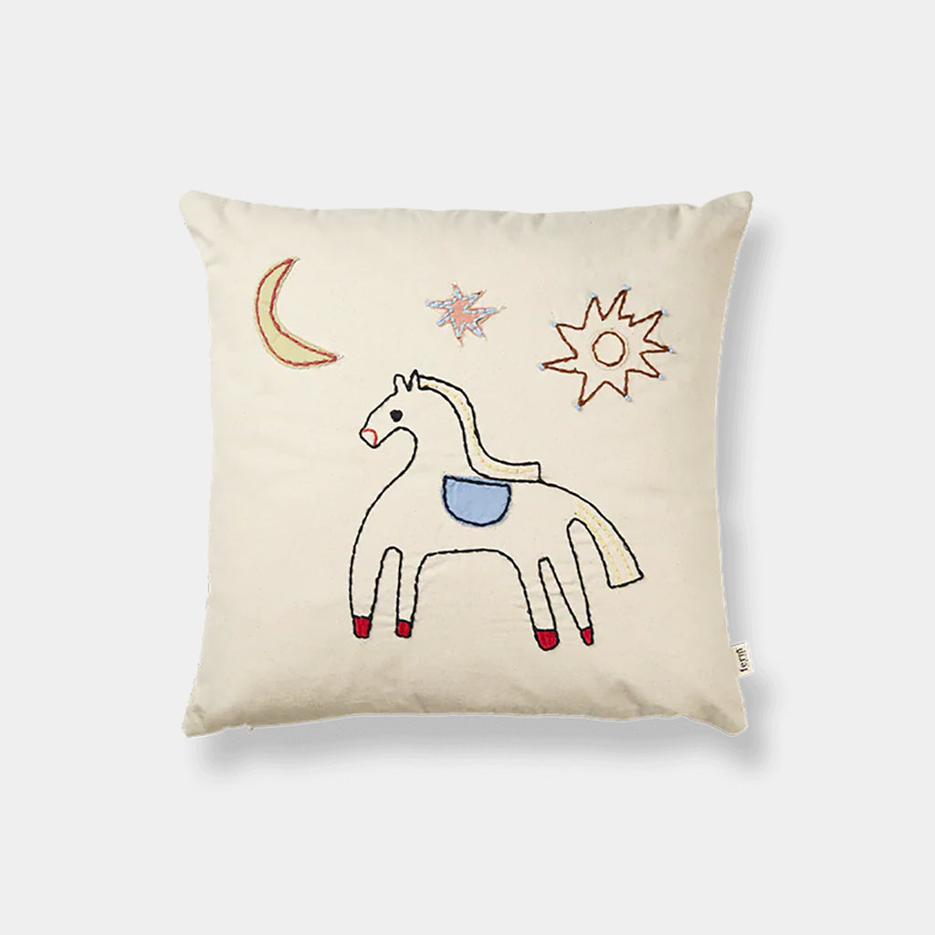 Ferm Living Naïve Cushion with embroidered horse illustration in organic cotton on a neutral background.
