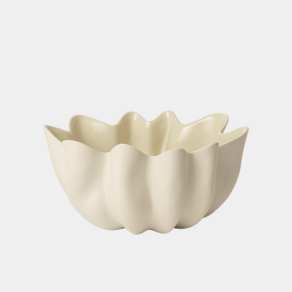 Ferm Living Nium Bowl in off-white stoneware featuring sculptural textile-inspired folds and a glazed interior