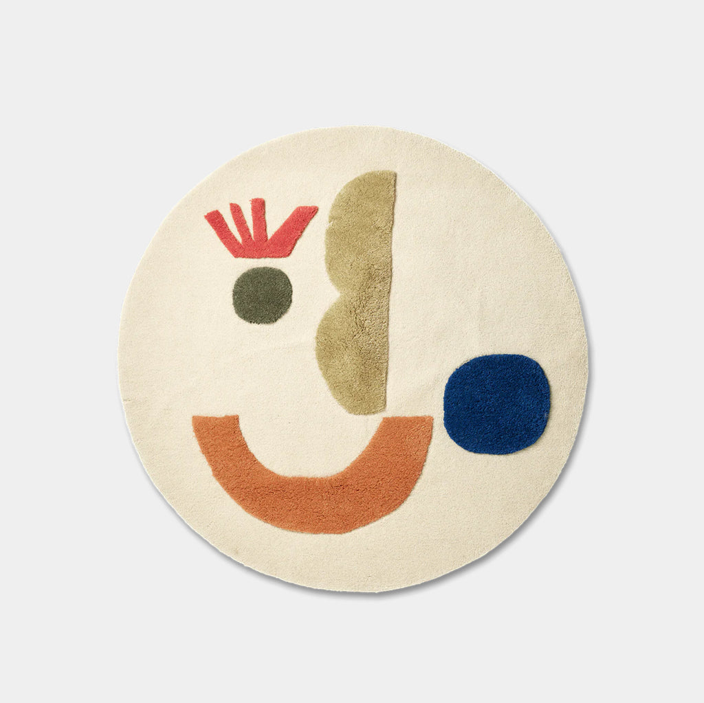 Ferm Living Panto rug in tufted wool with raised geometric shapes forming an abstract smiling face
