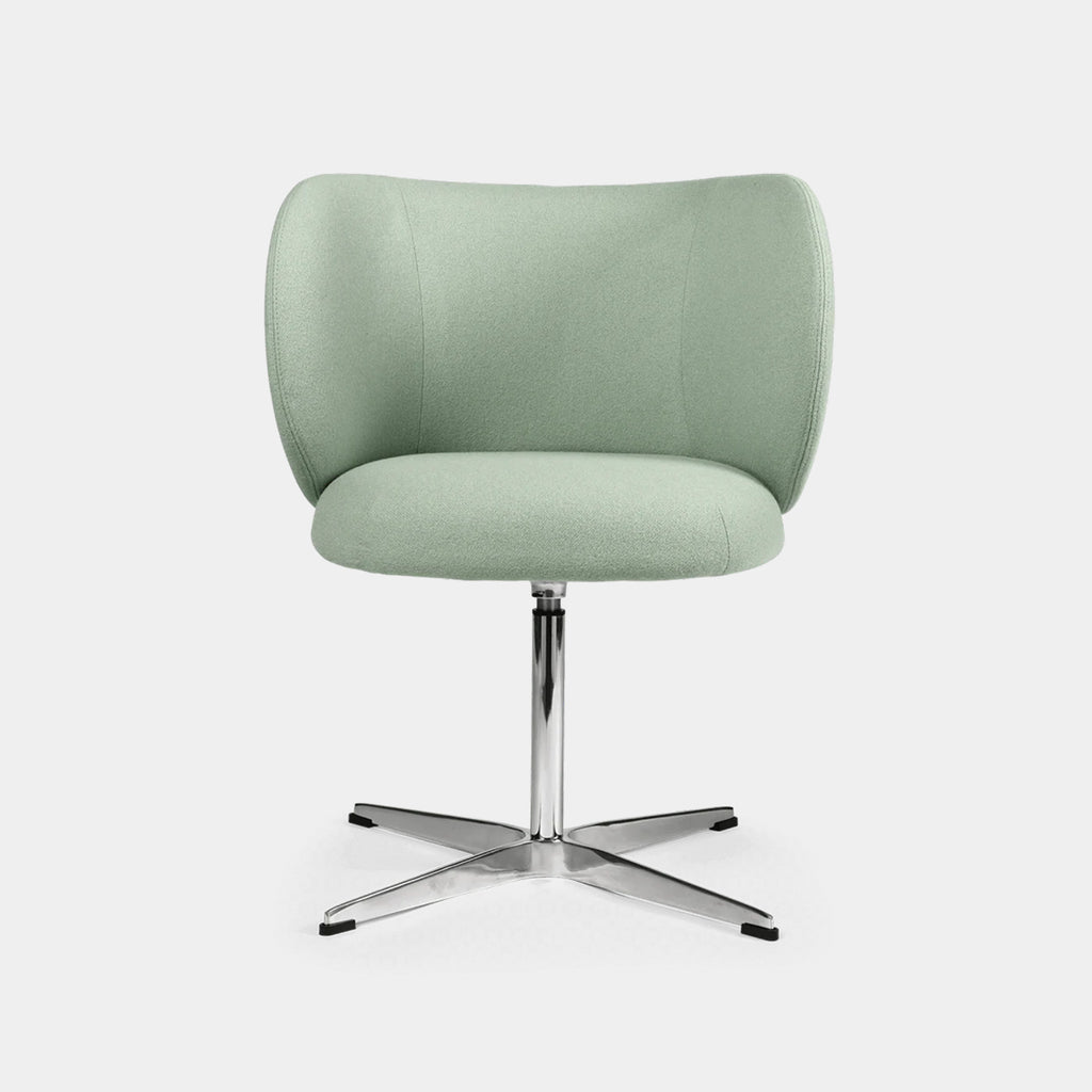 Ferm Living Rico Swivel Dining Chair upholstered in Mint Tonus with sculptural curved seat and swivel base