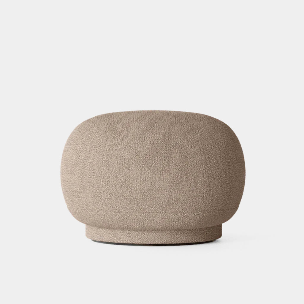 Ferm Living Rico Pouf upholstered in bouclé with rounded sculptural form, neutral background