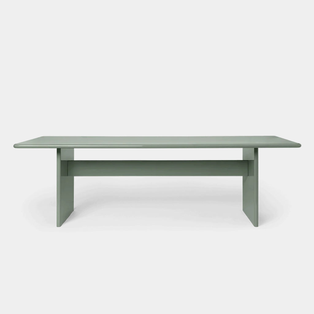 Ferm Living Rink Dining Table large in tea green with sculptural high-gloss silhouette