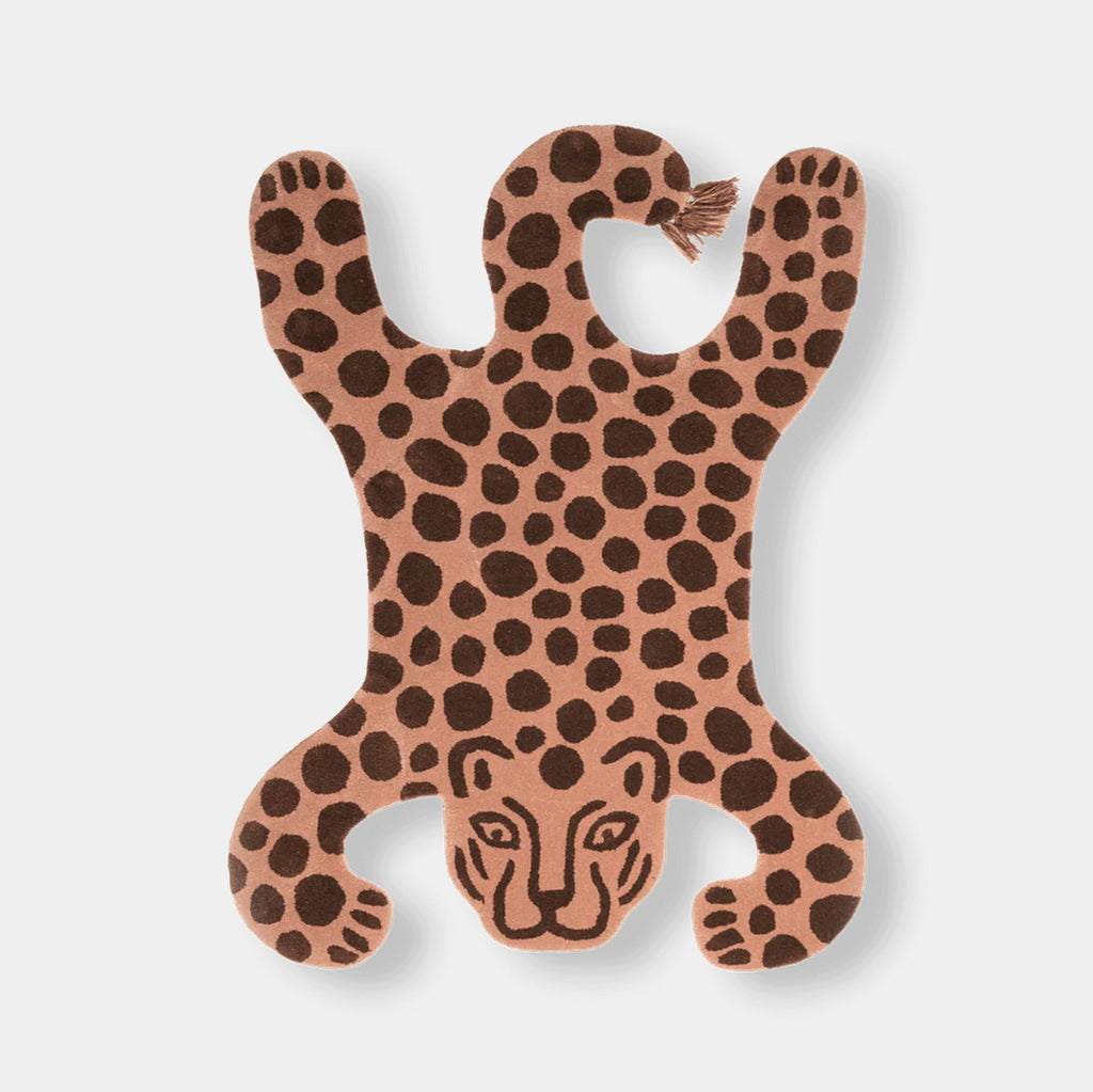 Ferm Living dusty rose tufted leopard rug in New Zealand wool on a neutral background