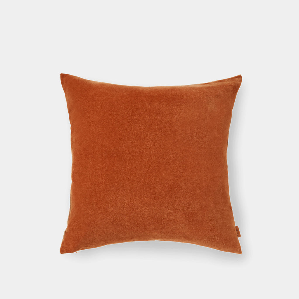 Ferm Living Senti cushion in Baked Clay showing plush cotton velvet surface with soft, tactile finish
