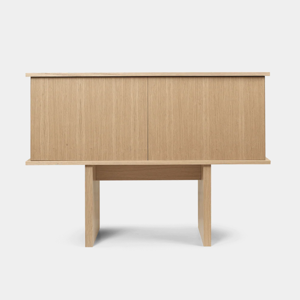 Stilt Sideboard Single in natural FSC™ oak with elevated, pillar-like legs and minimalist form