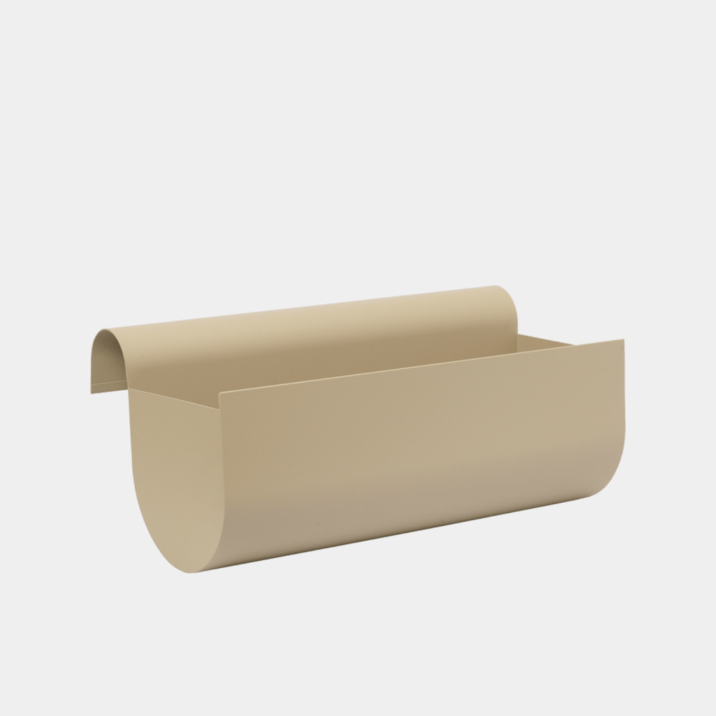 Medium ferm LIVING Uma Balcony Box in Cashmere powder-coated steel, showing its sculptural minimalist silhouette.