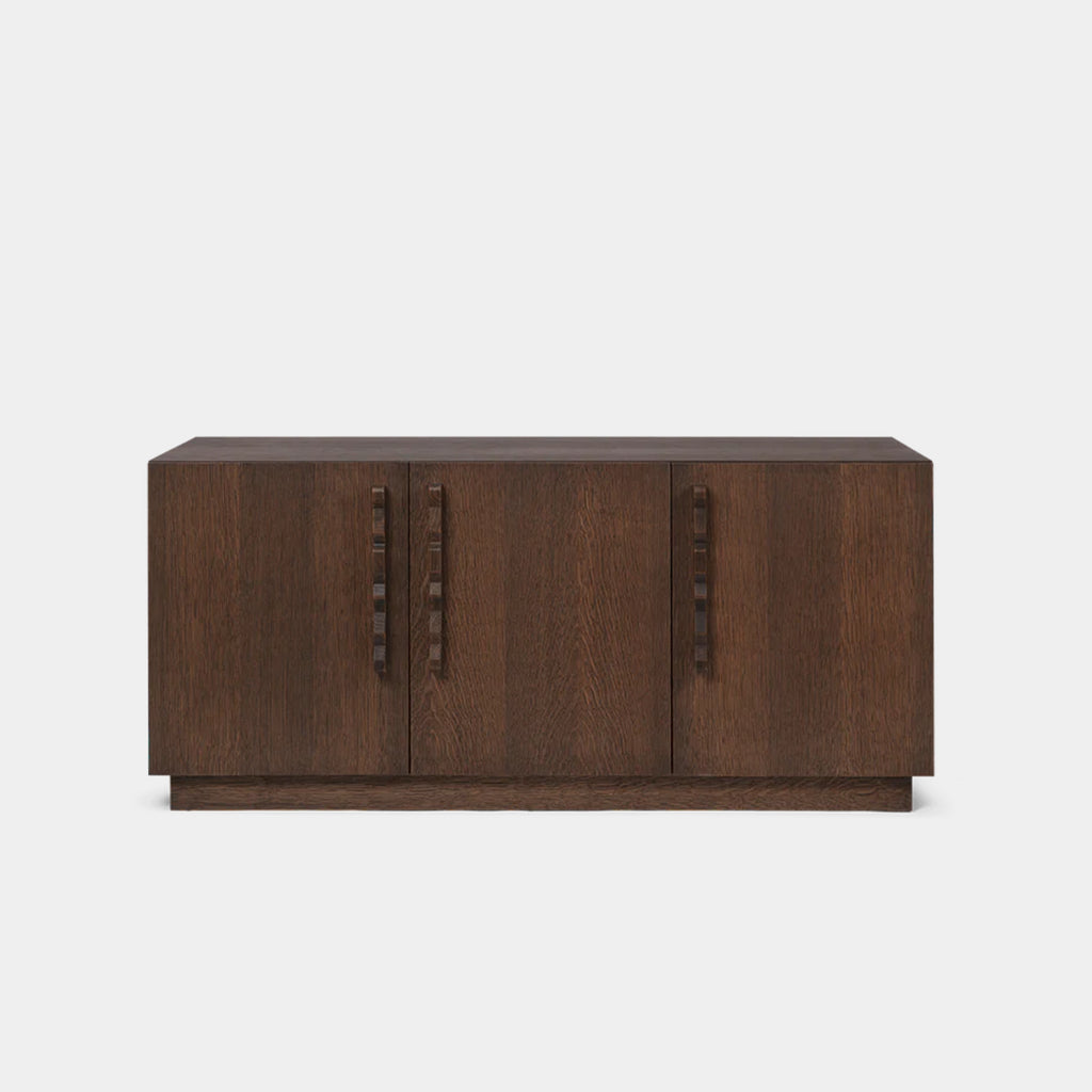 Unda Sideboard in dark stained oak featuring rippled handles and a clean architectural design