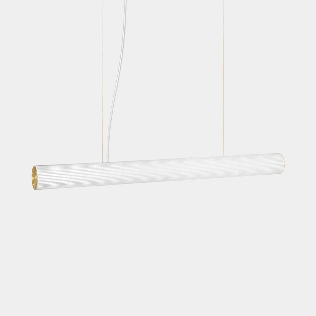 Ferm Living Vuelta pendant with rippled opal glass and brushed brass details on a neutral background