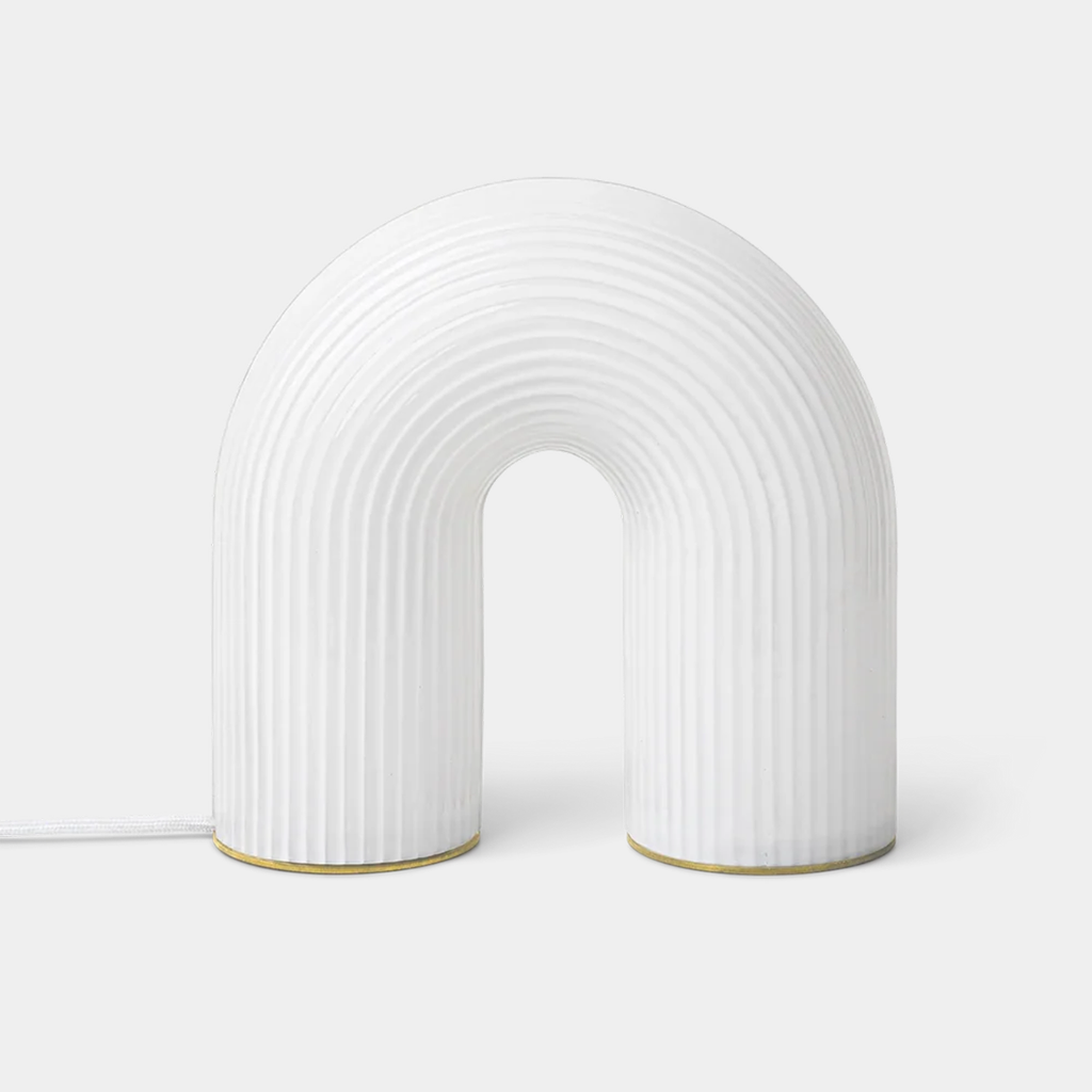 Ferm Living Vuelta Table Lamp in White with arched form and rippled opal glass