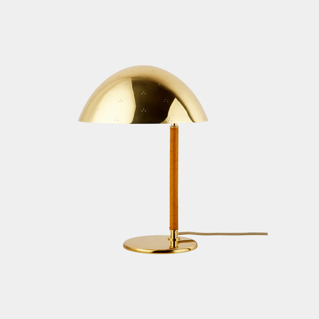 GUBI 9209 Table Lamp by Paavo Tynell with perforated brass shade and curved arm.