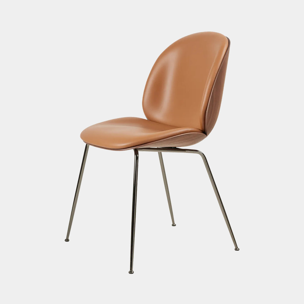 Beetle chair by GUBI with veneer shell in Sorenson Ultra Leather, highlighting its insect-inspired sculptural form