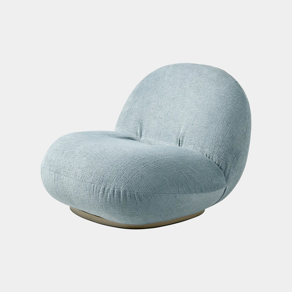 GUBI Pacha Chair upholstered in Mumble Glamour 10 fabric with soft textured surface and sculptural rounded form