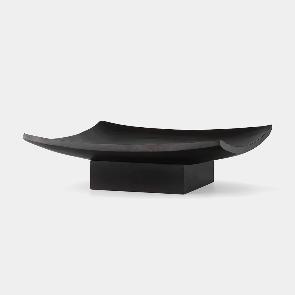 Audo Copenhagen Relevé Platter — acacia wood sculptural platter with floating base and curved edges